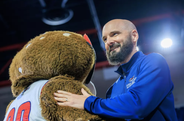 First time head coach John Jakus with FAU’s mascot Owlsley at Paradise Madness on Oct. 16. 